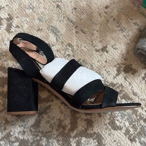 Never been worn triple strap black velvet heeled sandals.